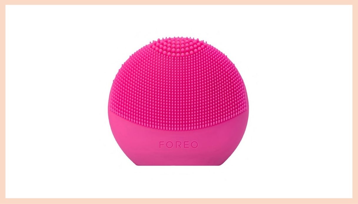 spazzolino rosa fucsia per pulire il viso rotonda
