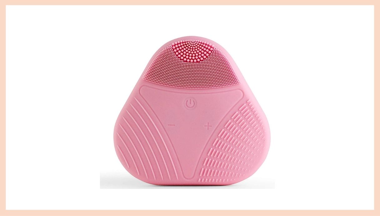 spazzola pulizia viso rosa triangolare con vari pattern