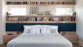 Design per bibliofili: libreria e testata letto insieme