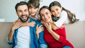 Genitori felici? Sì, ma attenti al numero dei figli