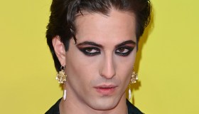 Cosmogonie di Gucci: trasparenze, latex, stivali cuissard. E i Maneskin