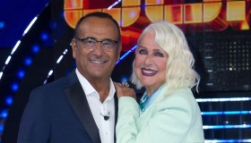 “Domenica In”, Loretta Goggi rivela: Carlo Conti ha esaudito l’ultimo desiderio di suo marito